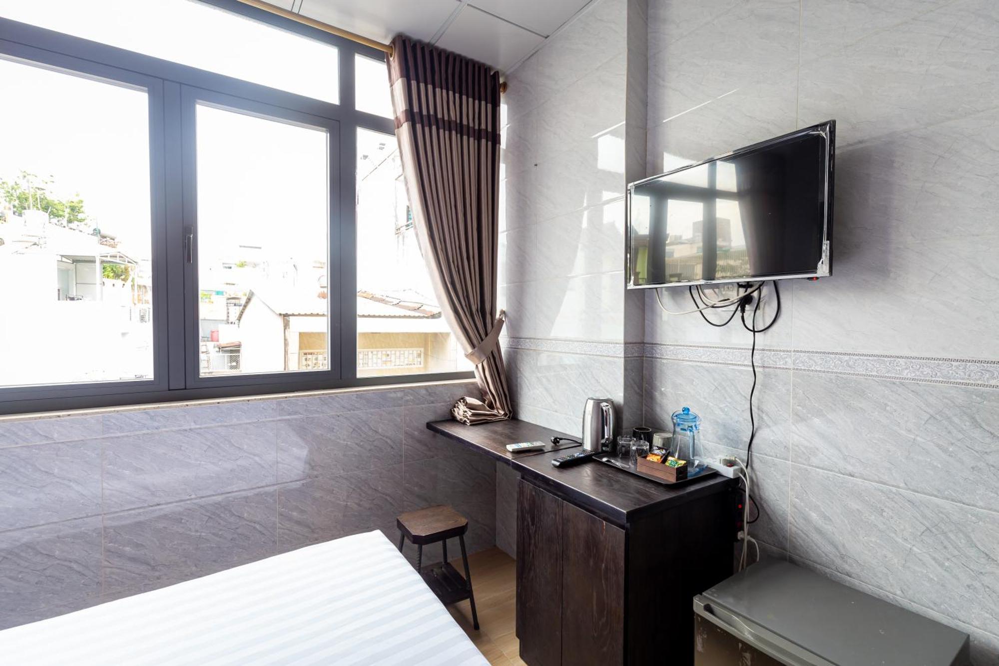 Cola'S Homestay Хошимин Экстерьер фото